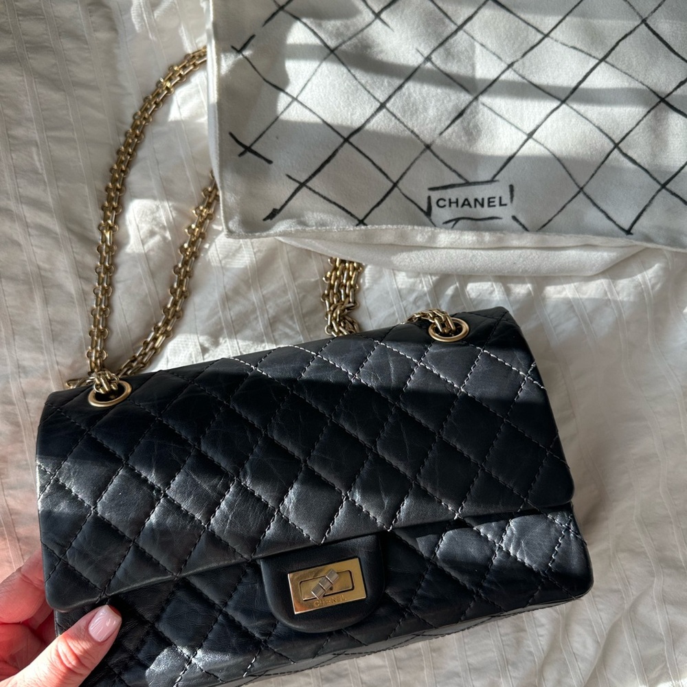 CHANEL Black and Gold Quilted Shoulder Bag